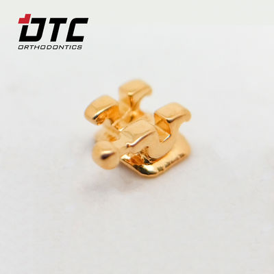 Certificado CE DTC Ortodoncia Dental Roth MBT Serie Delicada Dorada Brackets con ganchos Maquinaria Fuente de alimentación