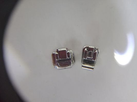 Clínica Tubos molares Brackets lingüísticos dentales para ortodoncia DTC Bracket autoligado